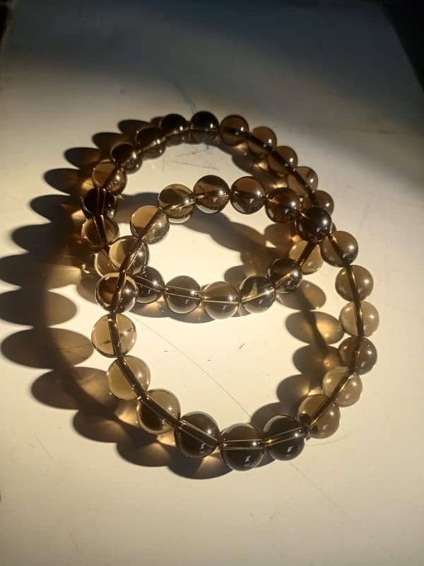 Introducing our stunning 8MM Natural Smoky Quartz Bracelets! 1