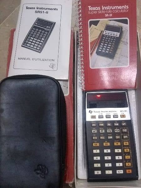 vintage since 1970s calculator with original box , original leatherbeg 1