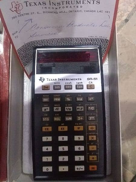 vintage since 1970s calculator with original box , original leatherbeg 5