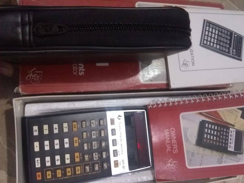 vintage since 1970s calculator with original box , original leatherbeg 6