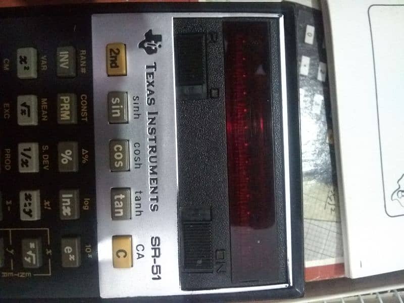 vintage since 1970s calculator with original box , original leatherbeg 9