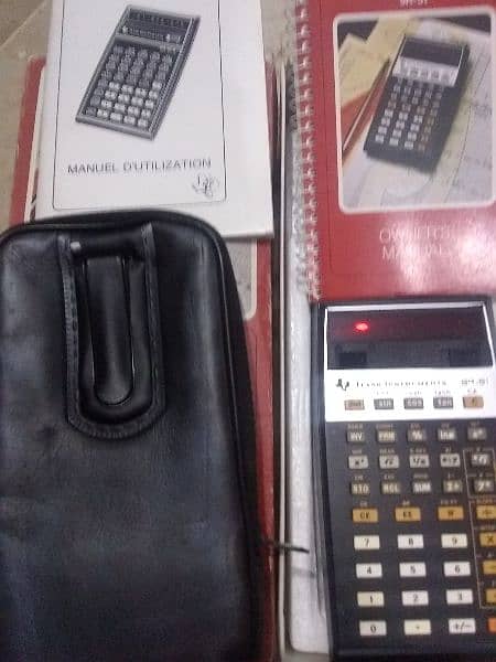 vintage since 1970s calculator with original box , original leatherbeg 12