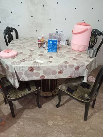 one table and 4 chairs