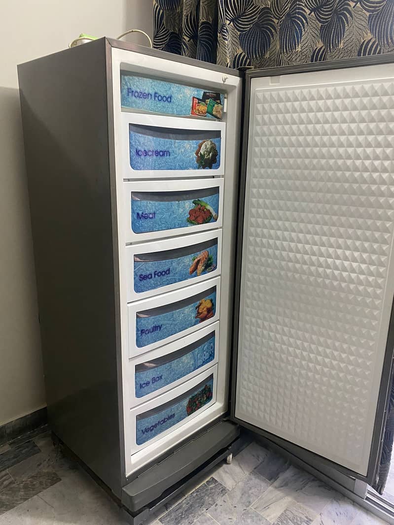 Dawlance Vertical Deep freezer with trolley for sale at excellent con 1