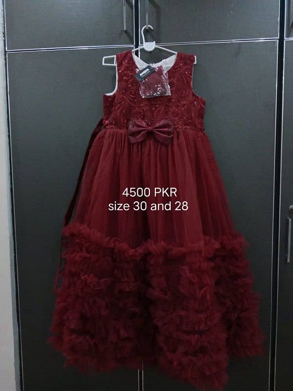 Maroon color net Frocks 0