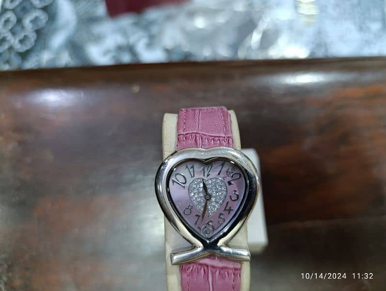 August Swiss Quartz Pink Heart Watch in 6500 only 3