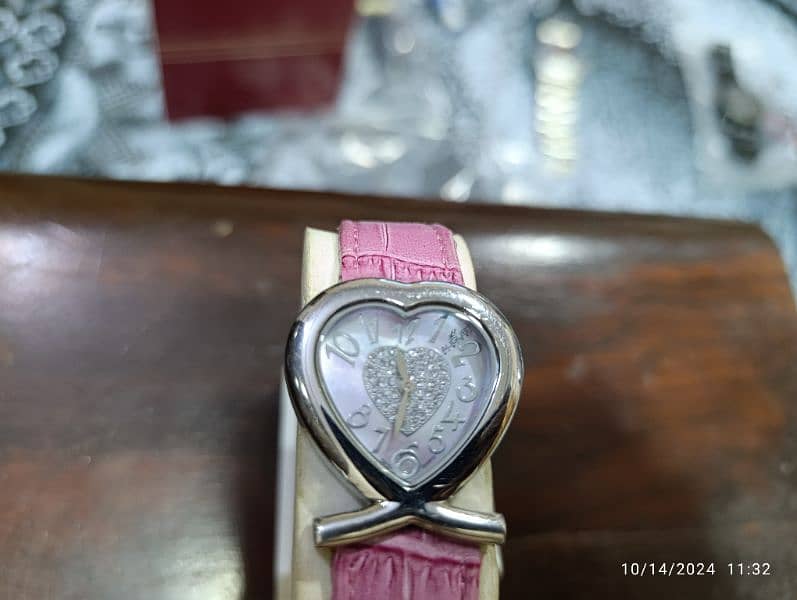 August Swiss Quartz Pink Heart Watch in 6500 only 4