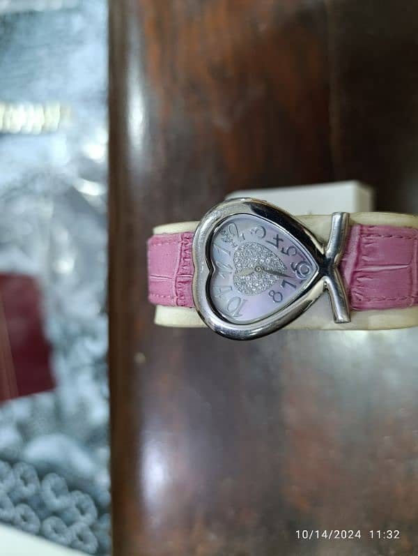 August Swiss Quartz Pink Heart Watch in 6500 only 5