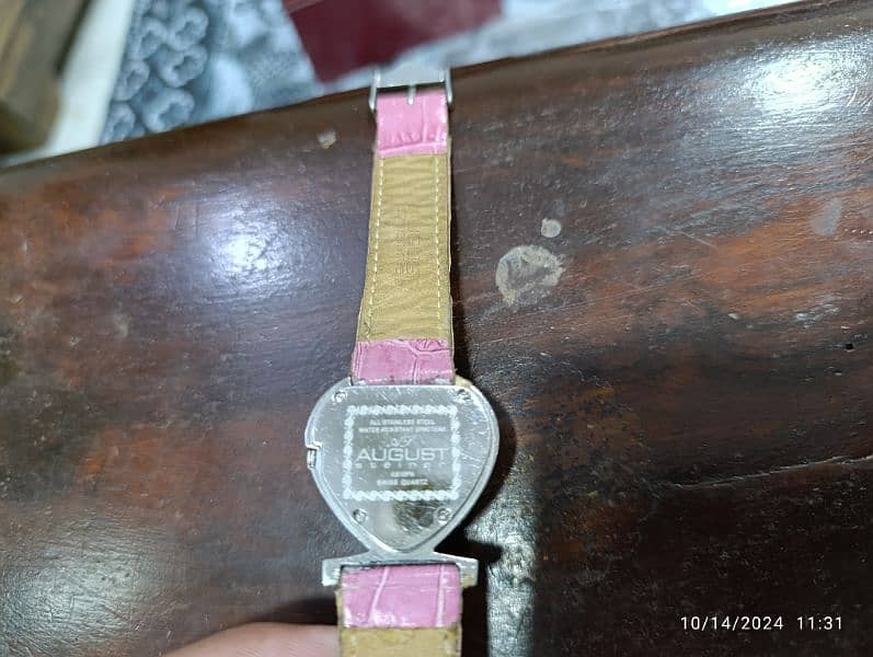 August Swiss Quartz Pink Heart Watch in 6500 only 11