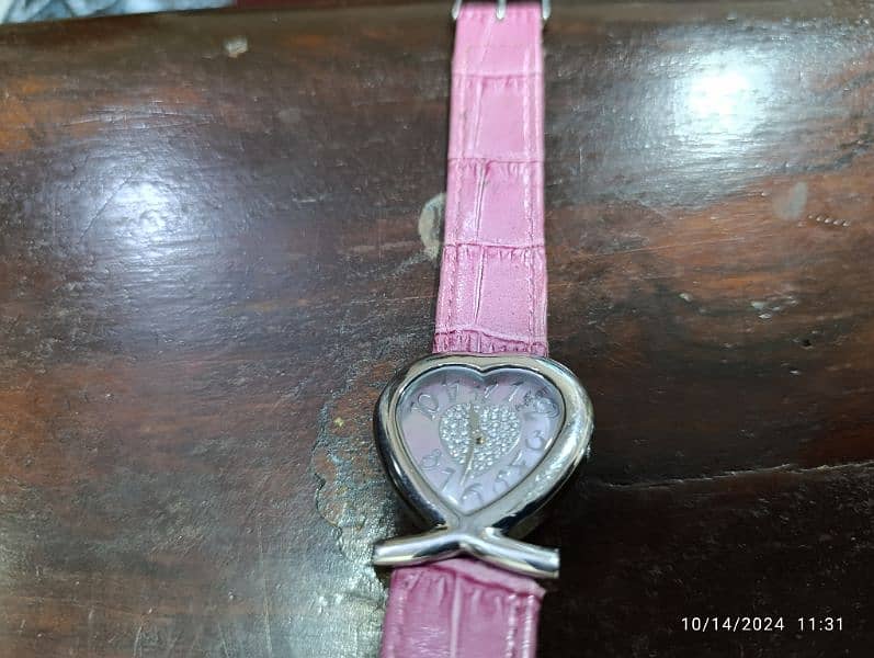 August Swiss Quartz Pink Heart Watch in 6500 only 12