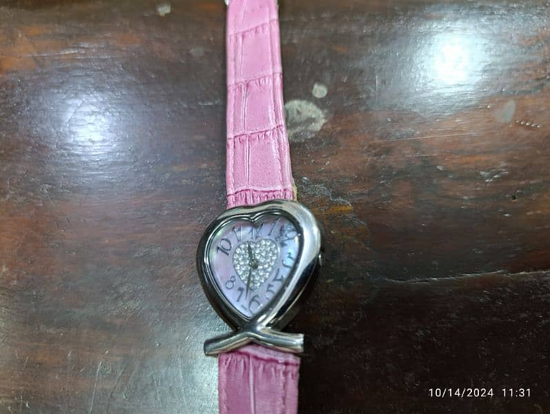 August Swiss Quartz Pink Heart Watch in 6500 only 13