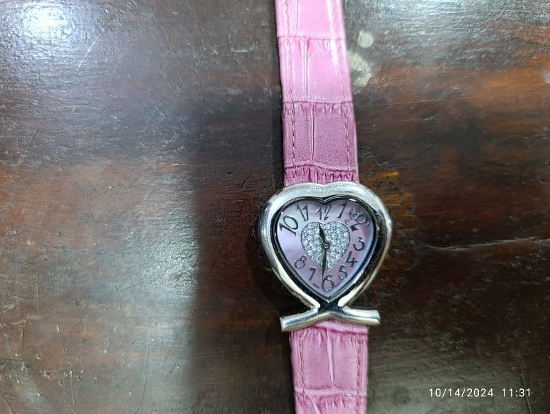 August Swiss Quartz Pink Heart Watch in 6500 only 14