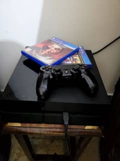 play station 4 500 gb with 2 cds