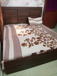 wooden  bed with dressing table