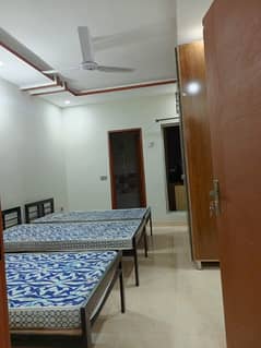 Running hostel building for rent setup for sale in johar town opposite " UMT university" hostels area