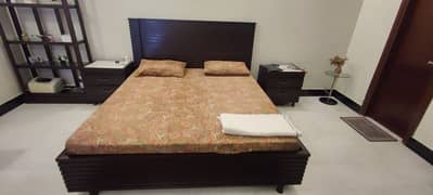 solid wooden bed, king-size in astute condition