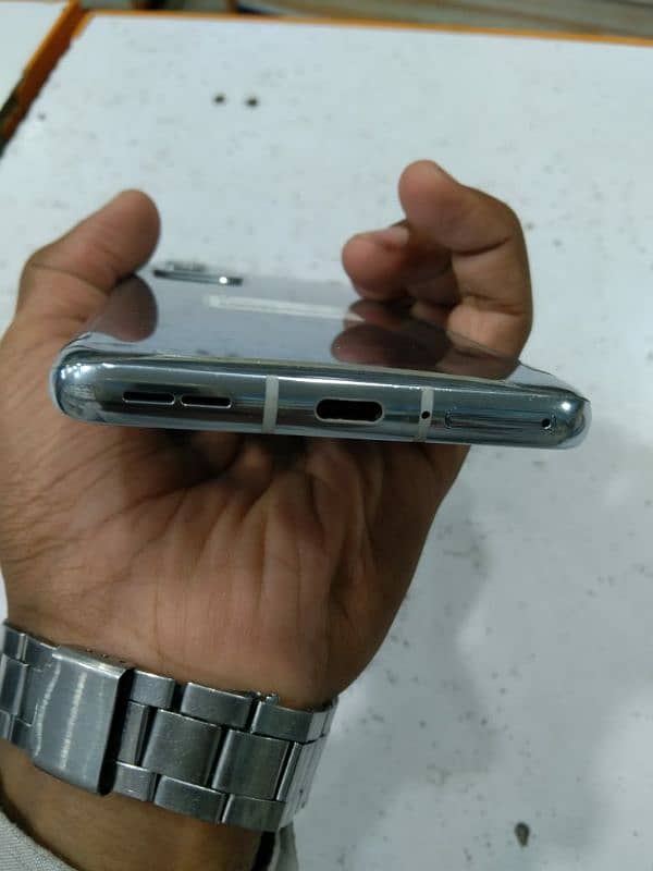 One plus 9 pro 12/512gb contact on WhatsApp 03247818761 3