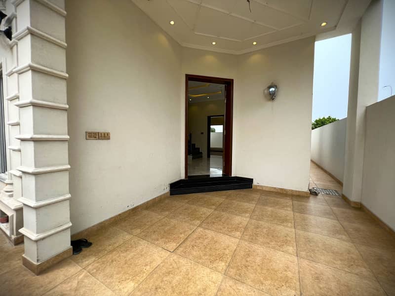 Experience Luxury And Convenience In This 4 Bedroom 5 Marla House In DHA 9 Town Block A 1