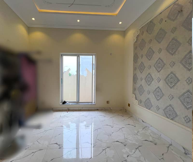 Experience Luxury And Convenience In This 4 Bedroom 5 Marla House In DHA 9 Town Block A 7