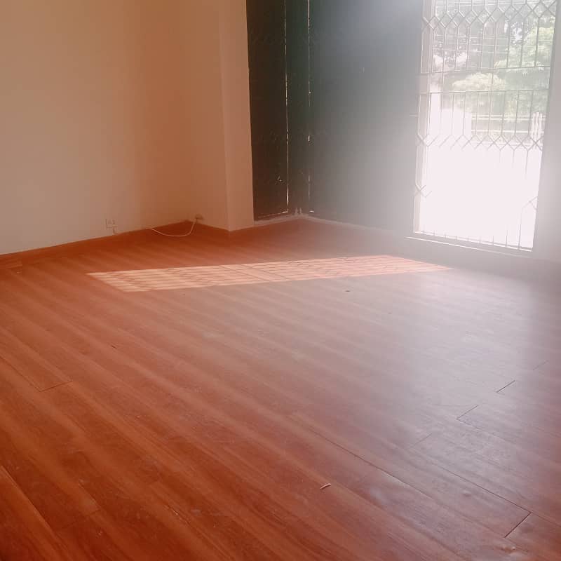 1 Kanal Awesome Tiled Wooden Floor Upper Portion Available For Rent in DHA Phase 1 Near Masjid Chowk 11