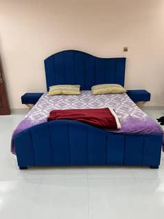 Blue Poshsih bed with side tables