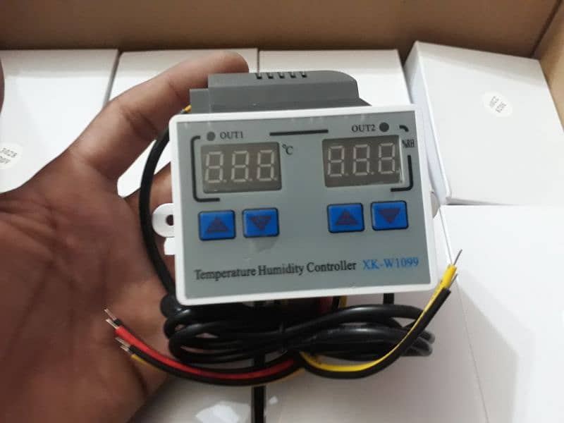 220V XK-W1099 Temperature and Humidity Controller in Pakistan 0