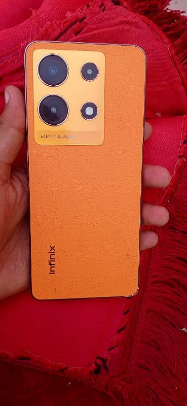 Infinix note 30 simple orange color 5