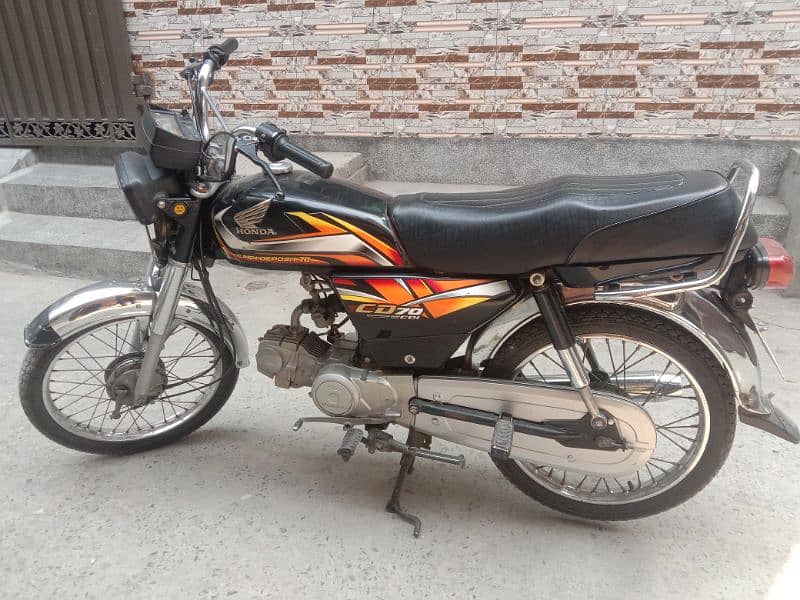 i am selling my bike Honda 70 2022 1st owner 1