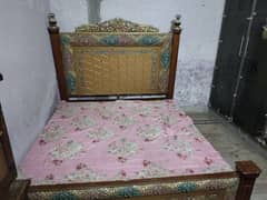 Large size bed with side tables nd show case dressing