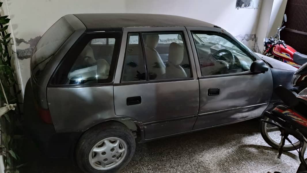 Suzuki Cultus Car in Motorcycle Price. 6