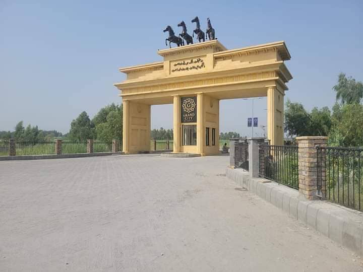 Corner 5 marla plot for Sale at grand City Mardan 1