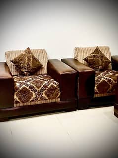 two single seater sofa