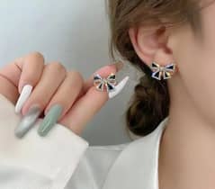 Bow design zircon stone earrings