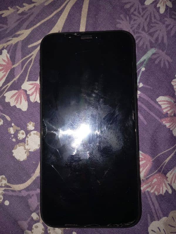 XR. 128 gb. 10 by 7 condition black colour . . JV. geniun bettery panel 2