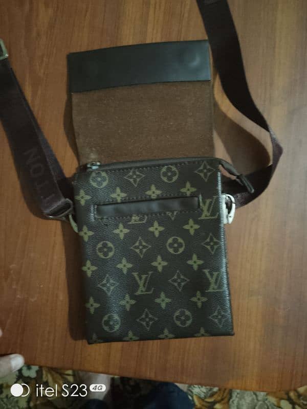 origional new louis Vuitton body bag 3