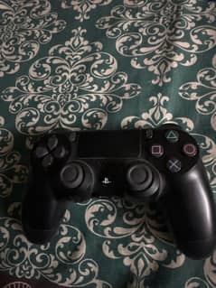 AN ORIGINAL PS4 CONTROLLER