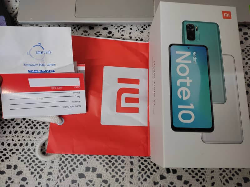 REDMI NOTE 10 FOR SALE WITH BOX, RECEIPT,CHARGER, AND 2 MOBILE COVERS 2