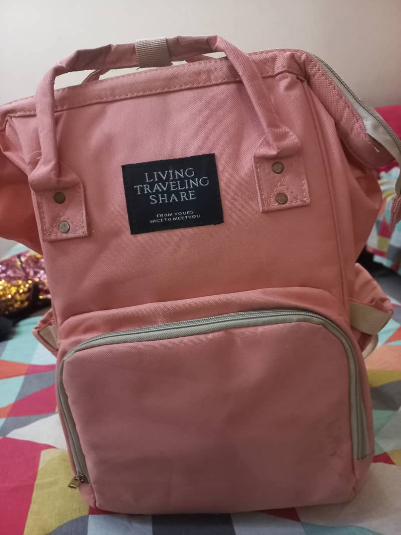 pink backpack for babies or travel 0