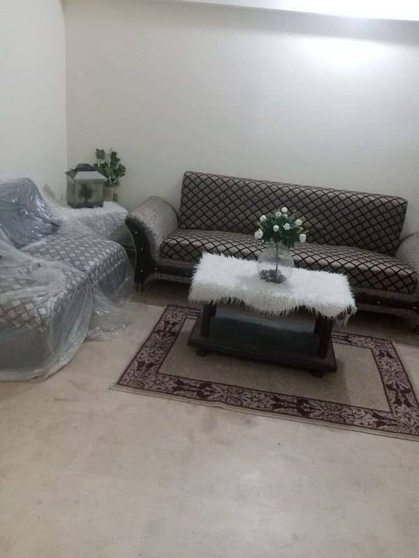 Sofa kum bed with 2 single sofa 1