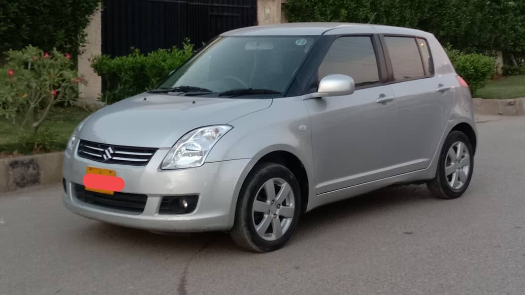 Suzuki Swift 2021 Auto 1.3 with Navigation. Only 29000 KMs 1st Owner 2