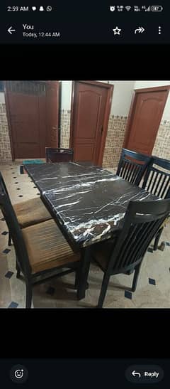 wooden table with marble top 0