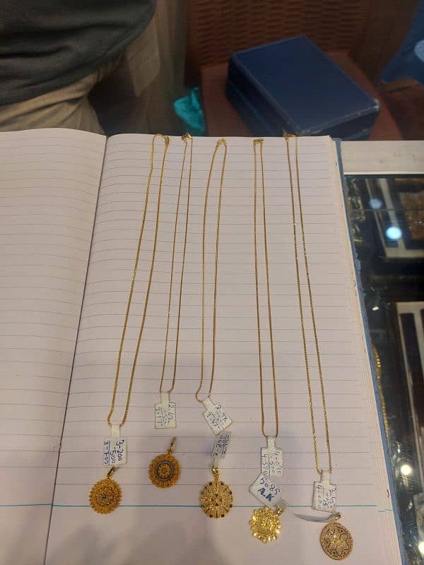 Gold/locket/chain/21carat/ 1