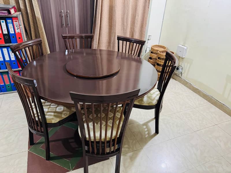 Revolving Top round wooden dining table set with 6 chairs 1