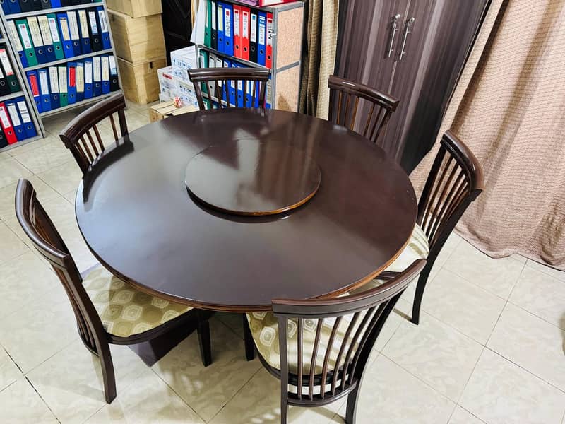 Revolving Top round wooden dining table set with 6 chairs 3