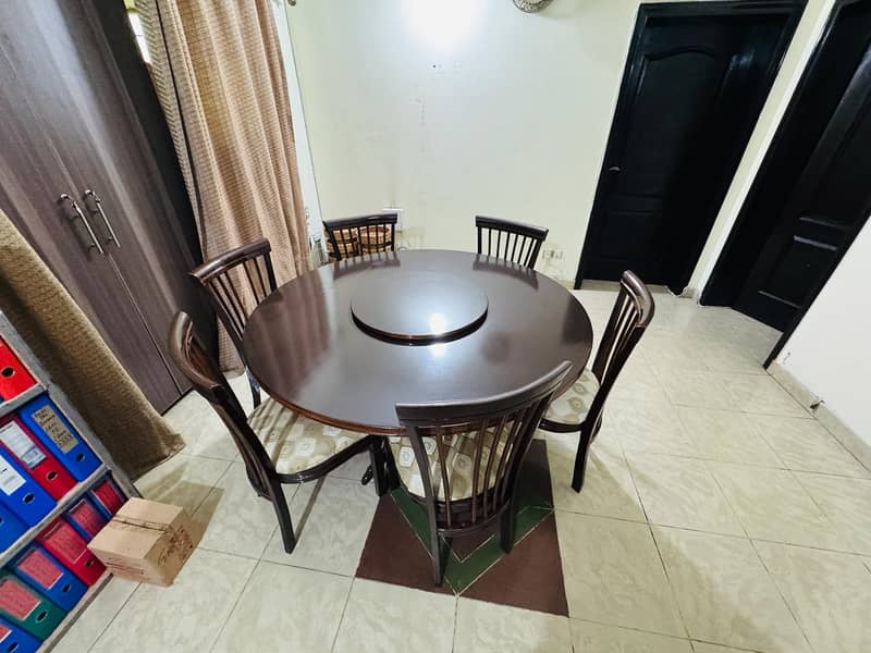 Revolving Top round wooden dining table set with 6 chairs 4