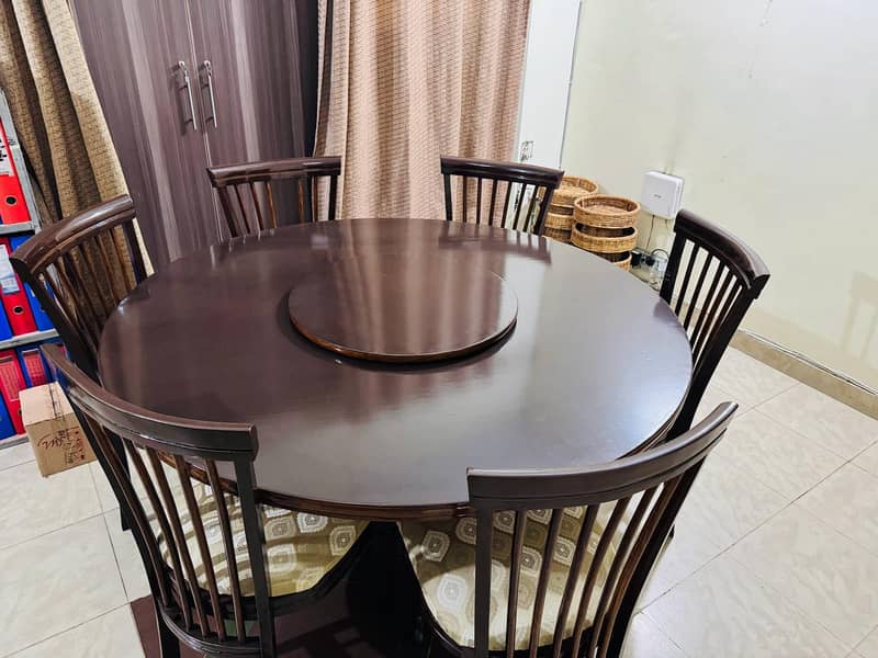 Revolving Top round wooden dining table set with 6 chairs 5