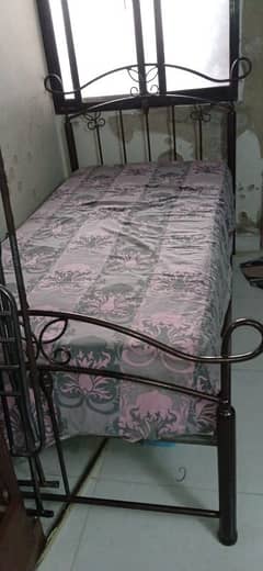 rod iron beds pair