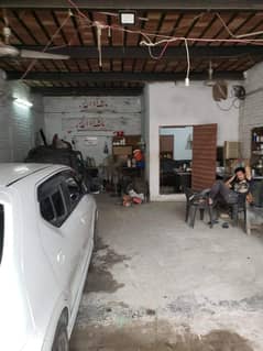 Oil change workshop Plot for rent in johar town main rushi market near university and petrol pumps