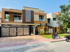 A BEAUTIFUL 1 KANAL HOUSE FOR SALE IN BABAR BLOCK SECTOR A BAHRIA TOWN LAHORE