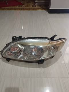 corolla and higet headlights 9/10 condition